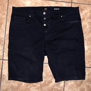 H&M men’s dark blue slim fit stretchy shorts.